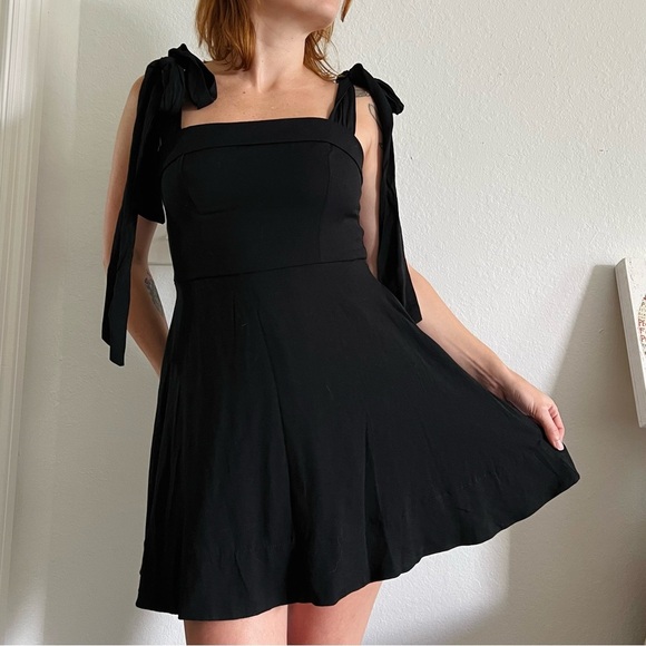 Francesca’s Black Bow Tie Coquette Babydoll Dress - Picture 1 of 4